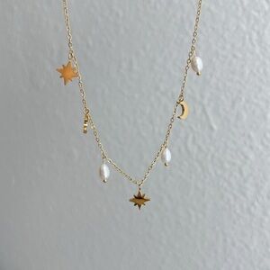 Gold Star and Moon Charm Necklace